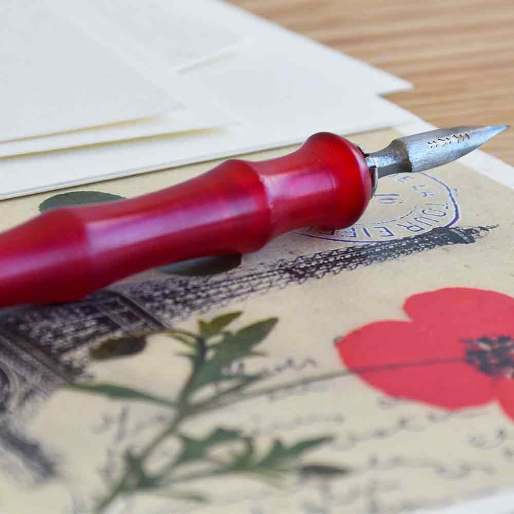 Porte-plume en Galalithe rouge. Porte-plume en Galalithe rouge.